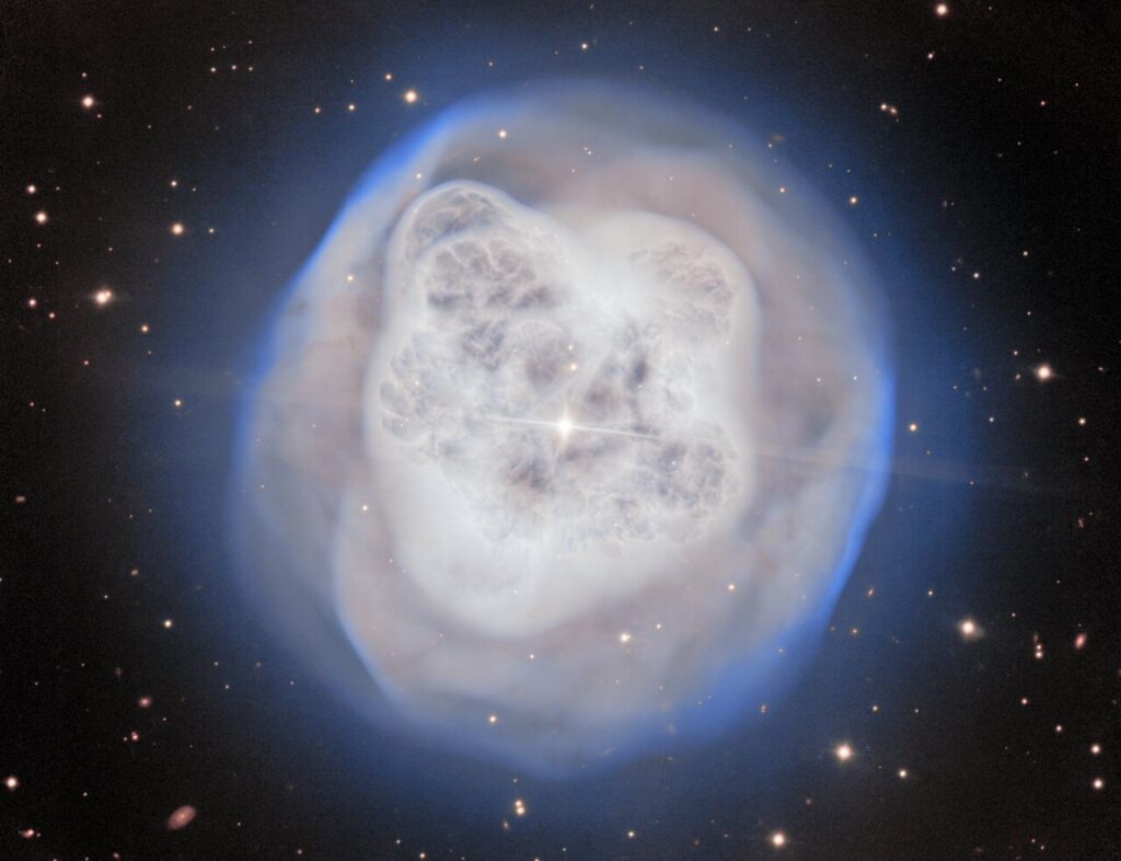 The 8.1-meter Gemini North telescope, located on the summit of Maunakea in Hawai‘i, has captured NGC 1514, nicknamed the Crystal Ball Nebula, in awe-inspiring detail. This nebula, with its mesmerizing glow of gas, harbors hints of a past stellar death, and its asymmetrical shell is now being shaped by the binary pair that lies at its center. Gemini North is one half of the International Gemini Observatory, partly funded by the U.S. National Science Foundation (NSF) and operated by NSF NOIRLab.
