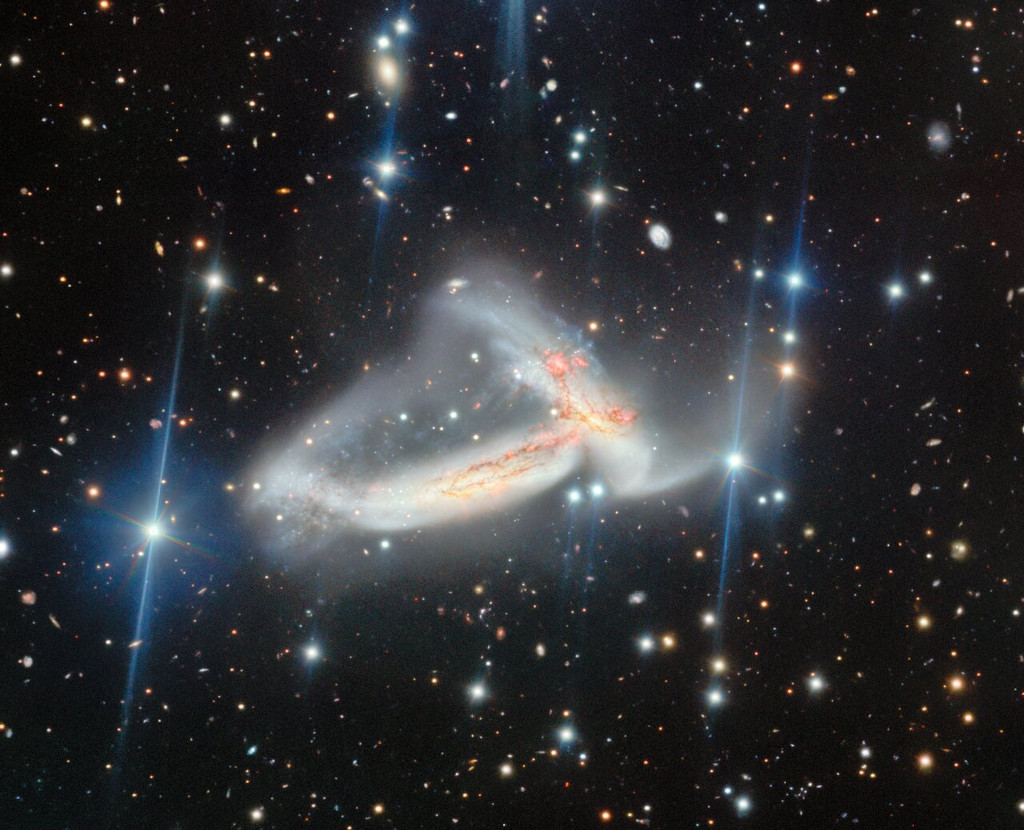 Nā ʻUhane Māhoe Huki Pū i ke Ola is the Hawaiian name given to this image of NGC 7253 — a pair of spiral galaxies caught in each other’s gravity. This image was captured by the Gemini North telescope on Maunakea, one half of the International Gemini Observatory, partly funded by the U.S. National Science Foundation (NSF) and operated by NSF NOIRLab. The name of the image, which translates to “The Twin Spirits Pulling Together Creating Life,” was chosen by the 2026 Project Hōkūlani interns.